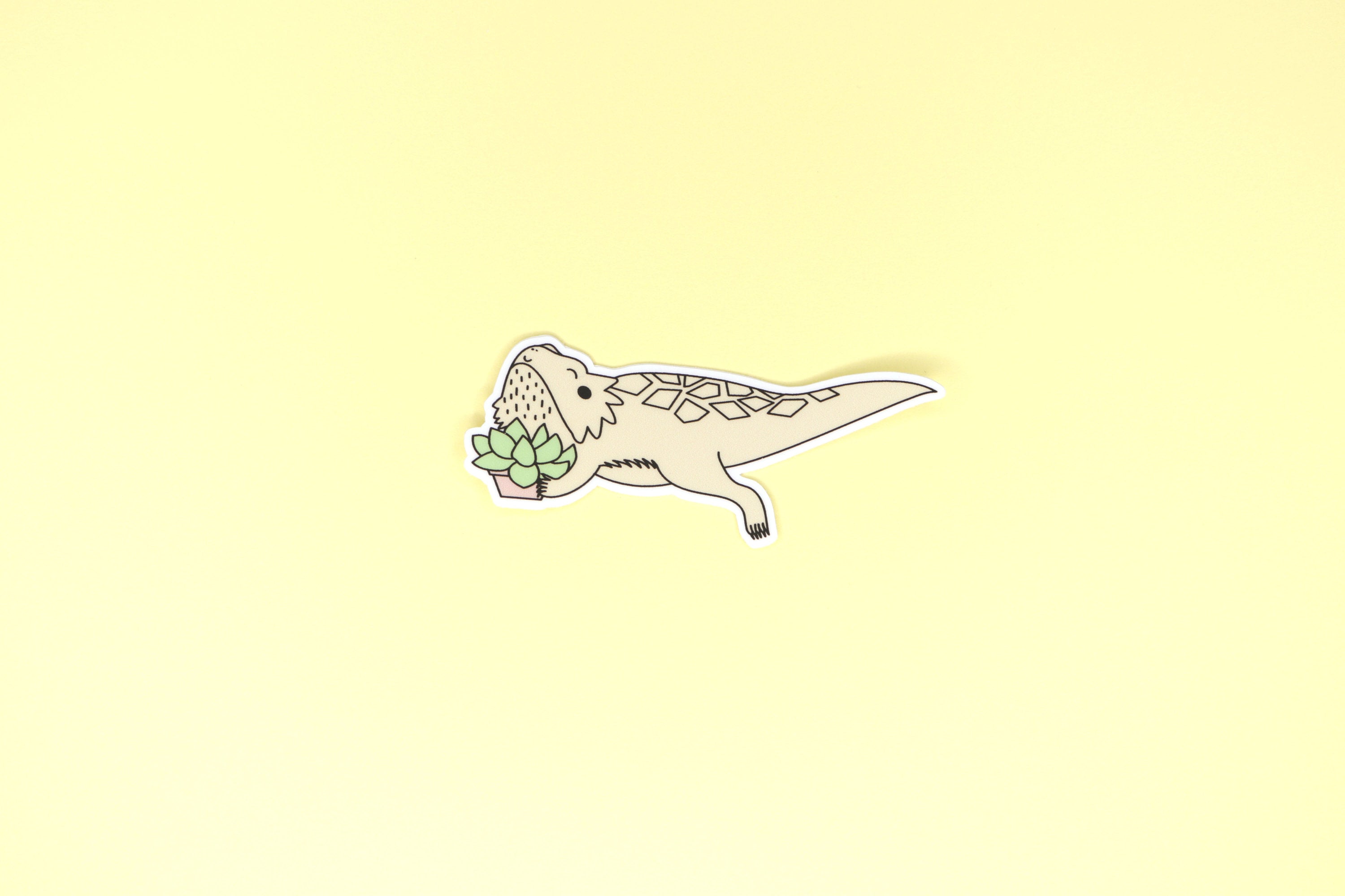 Tan Bearded Dragon Holding Succulent Sticker